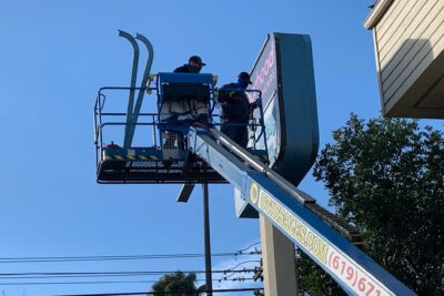 Installing New Lexan Sign Faces to Pylon Signs in Escondido CA