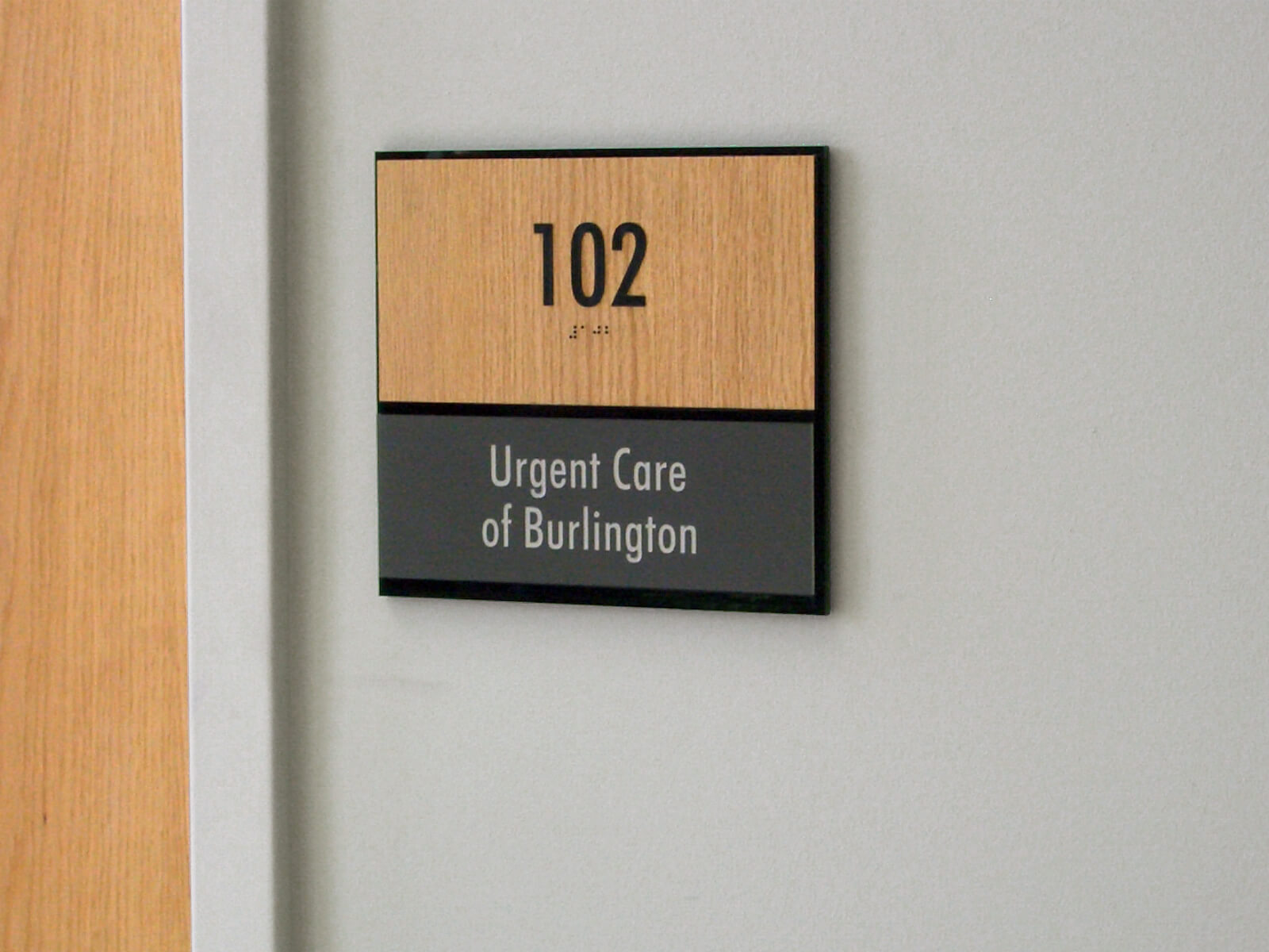 unlocking accessibility with braille tactile ada sign room 102 urgent care of burlington