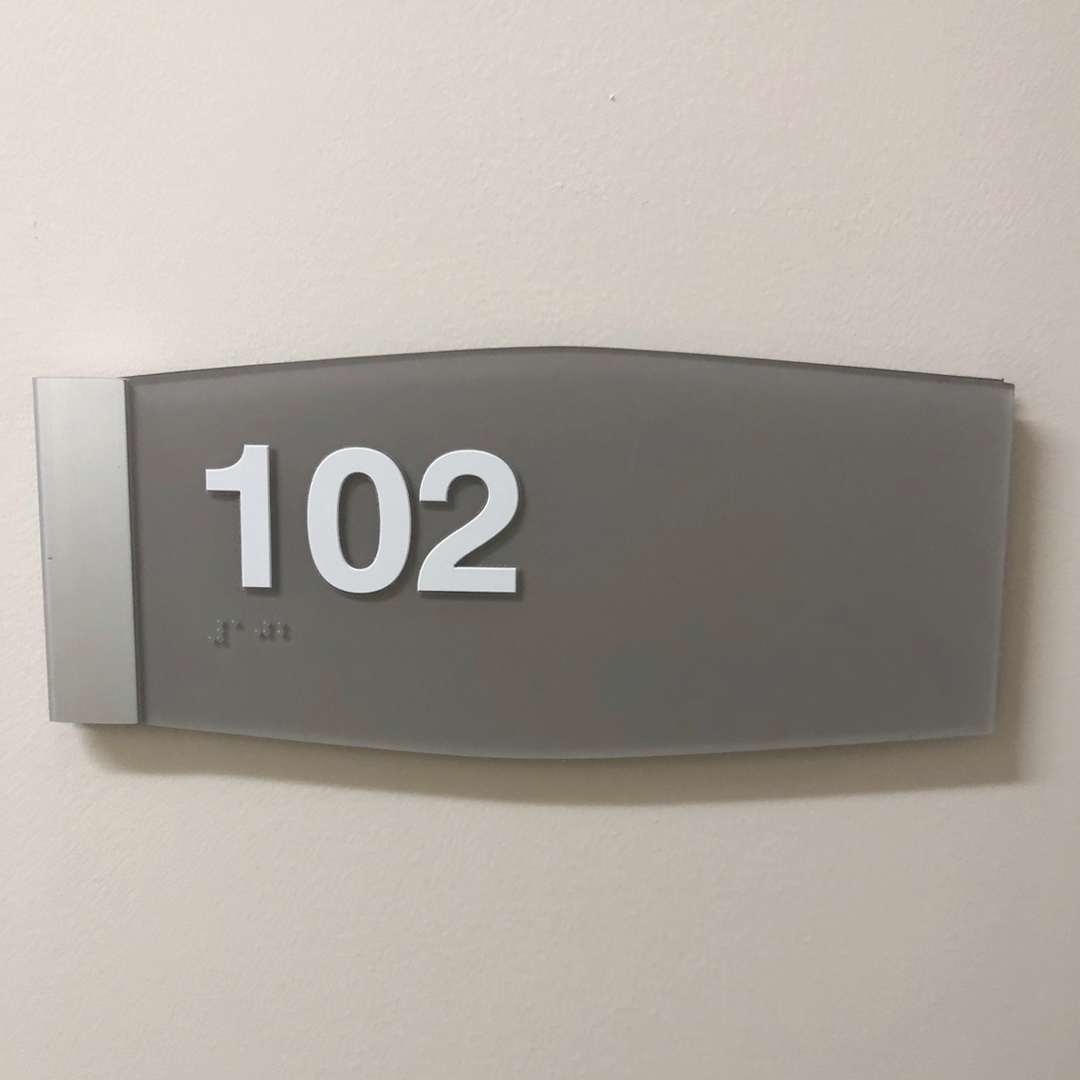 unlocking accessibility with ada braille tactile room sign