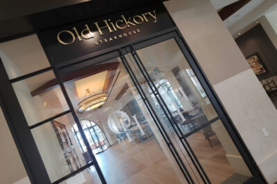 Dimensional letter signage installed at a restaurant entrance, demonstrating premium raised lettering used in professional business signage.