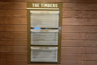 Interior tenant directory sign at The Timbers, 445 Marine View Ave, Del Mar, CA