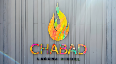 Colorful dimensional Chabad Laguna Niguel exterior signage mounted on modern building facade
