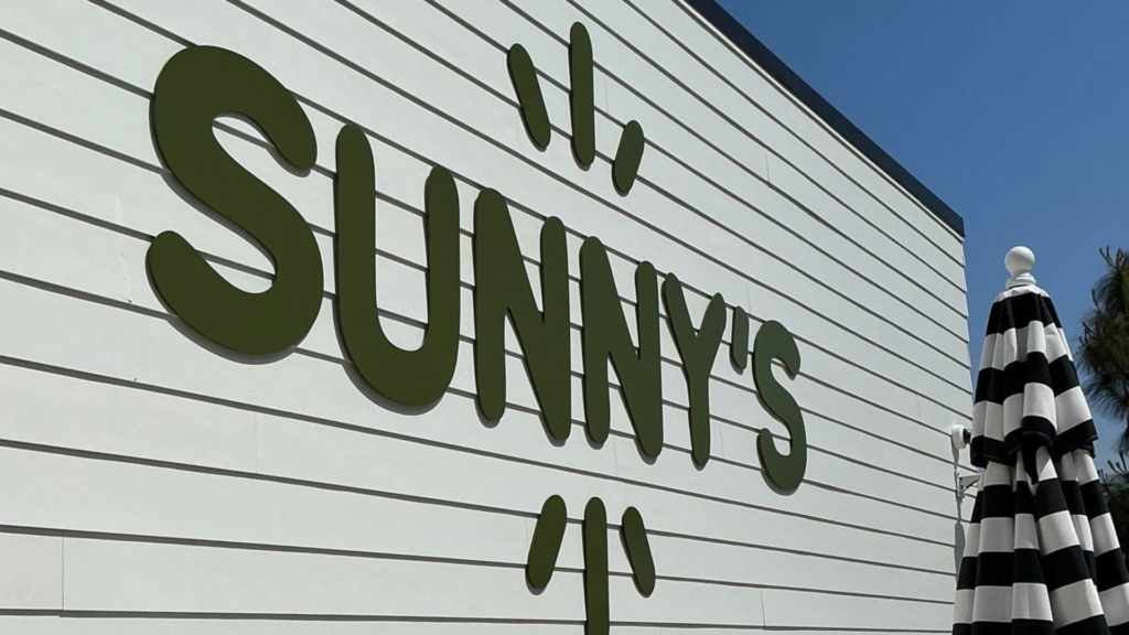 Custom dimensional letter storefront sign installed on a modern commercial building by a full-service San Diego sign company.