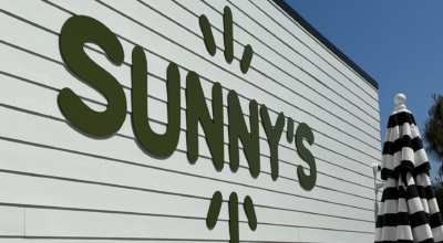 Custom dimensional letter storefront sign installed on a modern commercial building by a full-service San Diego sign company.