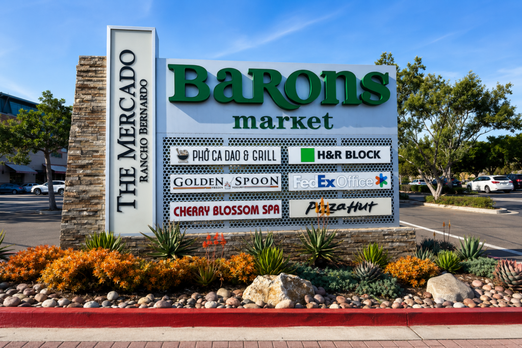 Modern multi-tenant monument sign at a San Diego shopping center showcasing professionally installed exterior business signage that complies with local permitting requirements.