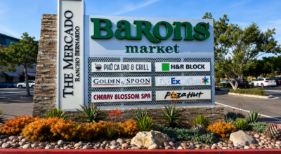 Modern multi-tenant monument sign at a San Diego shopping center showcasing professionally installed exterior business signage that complies with local permitting requirements.
