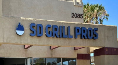 Custom blue channel letter storefront sign installed for SD Grill Pros in San Marcos, California by All Star Signs.