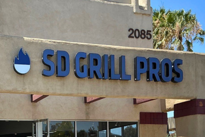 Custom blue channel letter storefront sign installed for SD Grill Pros in San Marcos, California by All Star Signs.