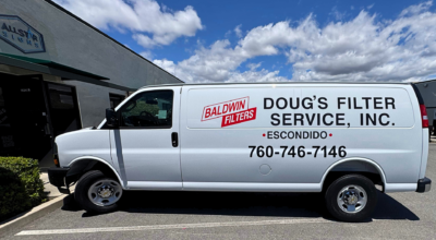 White commercial service van with professionally installed vinyl vehicle graphics for Doug's Filter Service in San Diego County, showcasing clean fleet branding by All Star Signs.