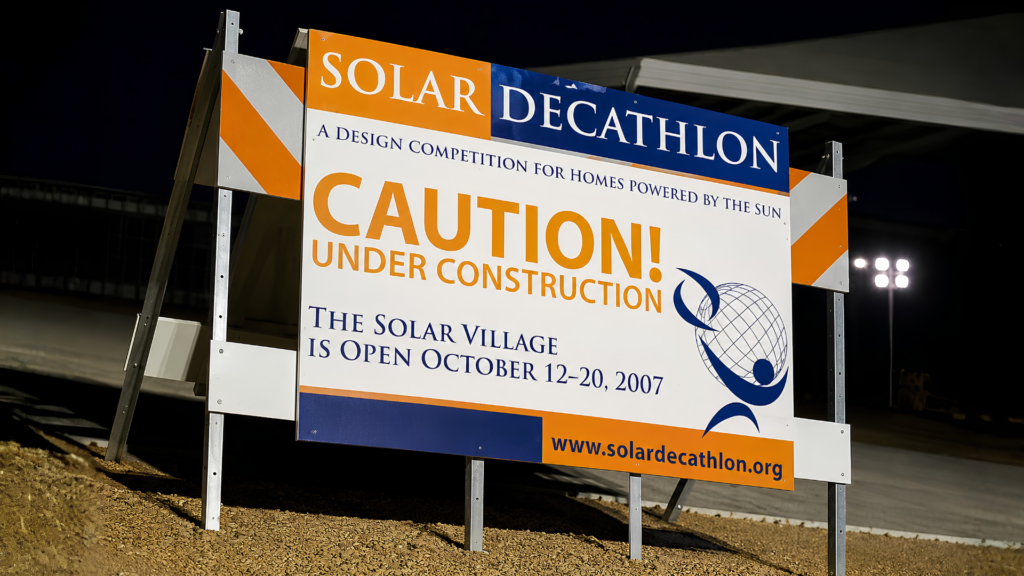 Temporary construction site sign installed at a San Diego commercial development, providing project information and improving public safety during construction.