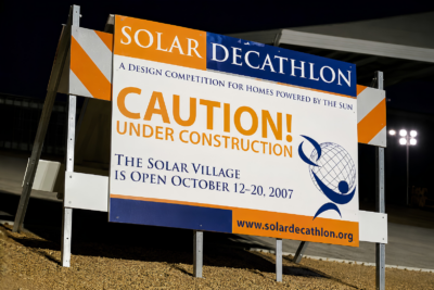 Temporary construction site sign installed at a San Diego commercial development, providing project information and improving public safety during construction.