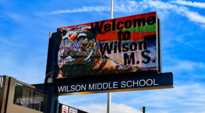 Digital school marquee sign at Wilson Middle School displaying a welcome message in San Diego County