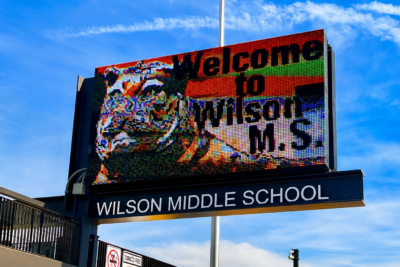 Digital school marquee sign at Wilson Middle School displaying a welcome message in San Diego County