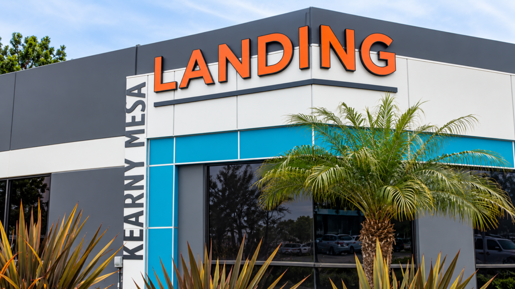 Custom building signs at Kearny Mesa Landing showcasing professional commercial signage in San Diego